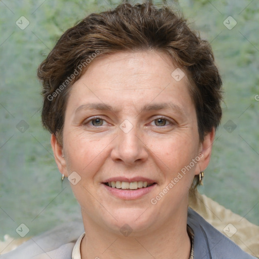 Joyful white adult female with short  brown hair and grey eyes