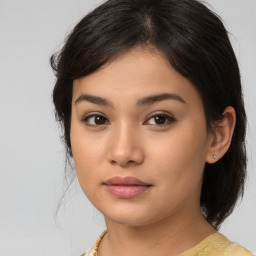 Neutral asian young-adult female with medium  brown hair and brown eyes