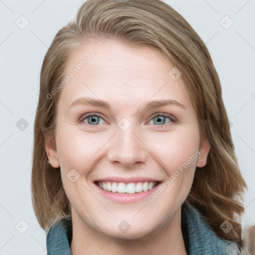 Joyful white young-adult female with medium  brown hair and blue eyes