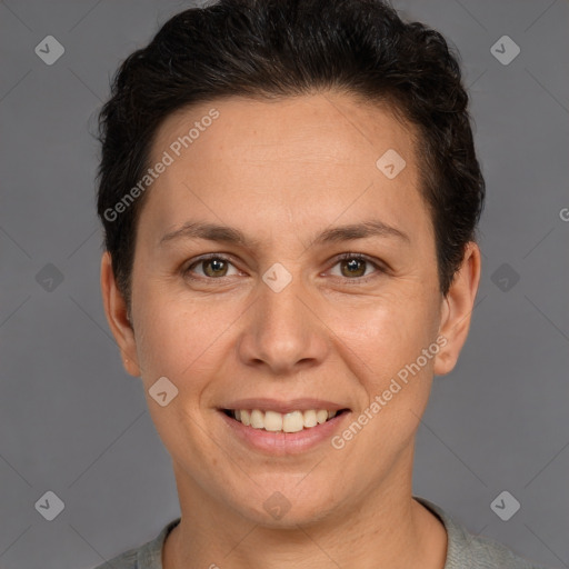 Joyful white adult female with short  brown hair and brown eyes