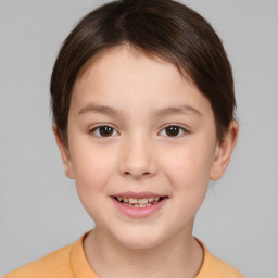 Joyful white child female with short  brown hair and brown eyes