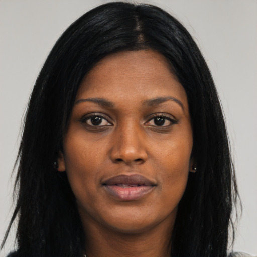 Joyful asian young-adult female with long  black hair and brown eyes