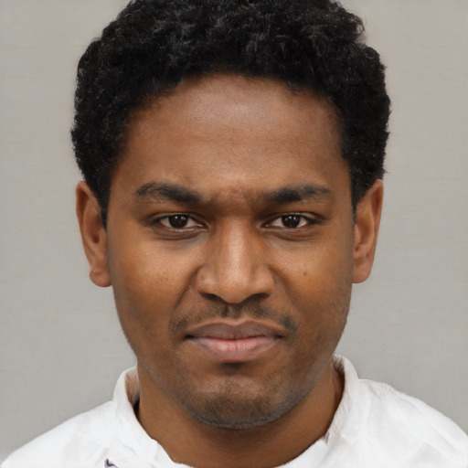 Neutral black young-adult male with short  brown hair and brown eyes