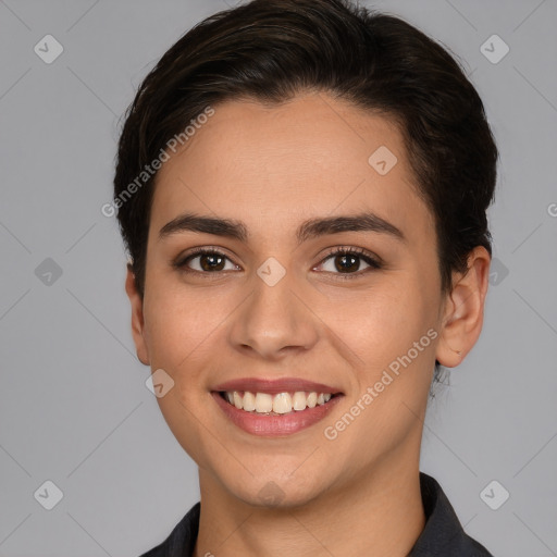 Joyful white young-adult female with short  brown hair and brown eyes