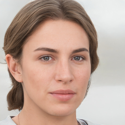 Neutral white young-adult female with medium  brown hair and grey eyes