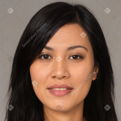 Joyful asian young-adult female with long  black hair and brown eyes