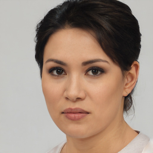 Neutral asian young-adult female with short  brown hair and brown eyes