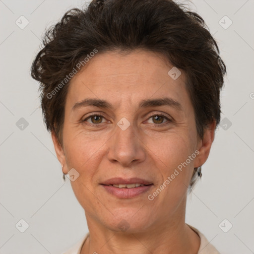 Joyful white adult female with short  brown hair and brown eyes