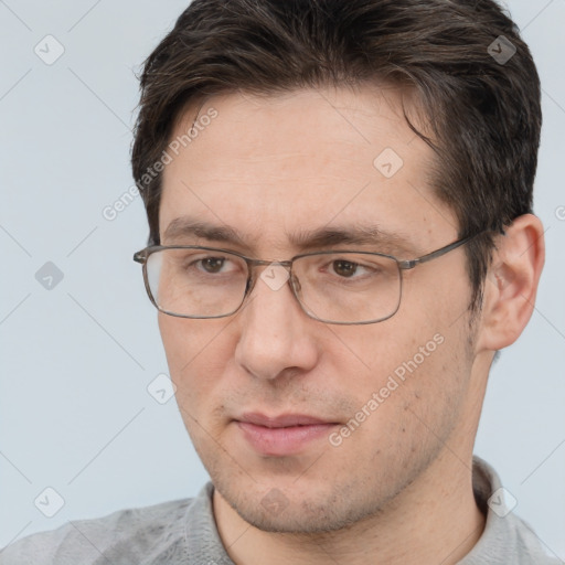 Neutral white adult male with short  brown hair and brown eyes