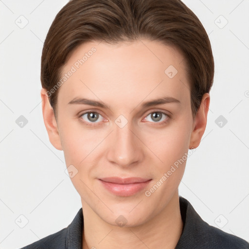 Joyful white young-adult female with short  brown hair and grey eyes