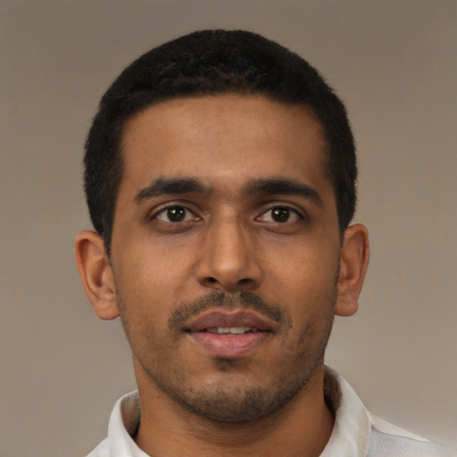 Neutral black young-adult male with short  brown hair and brown eyes