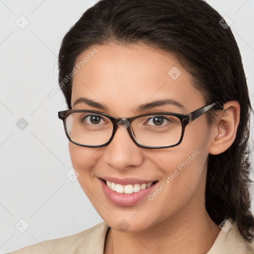 Joyful white young-adult female with medium  brown hair and brown eyes