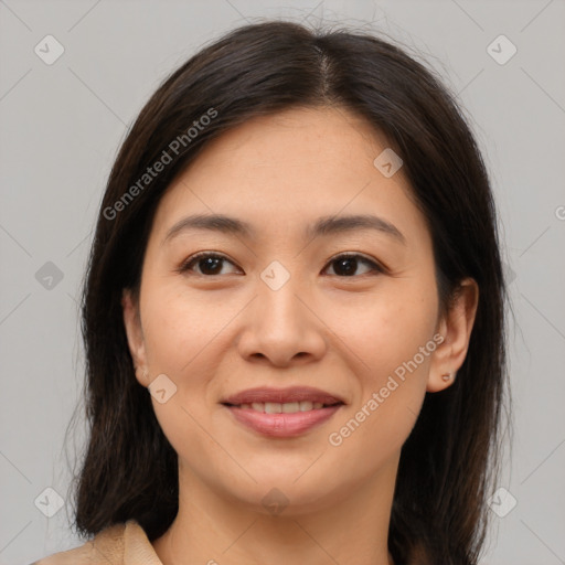 Joyful asian young-adult female with medium  brown hair and brown eyes