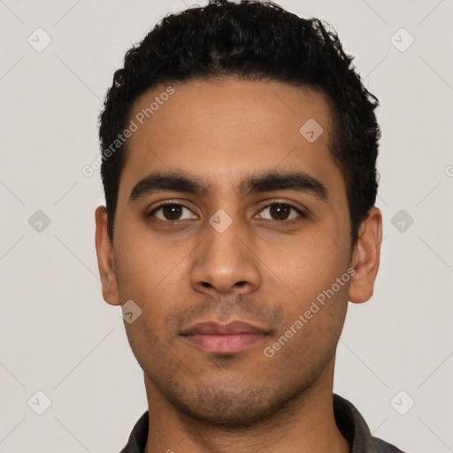 Neutral latino young-adult male with short  black hair and brown eyes