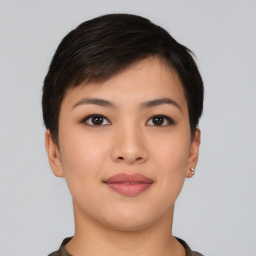 Joyful asian young-adult female with short  brown hair and brown eyes