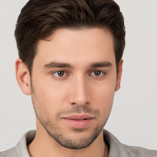 Neutral white young-adult male with short  brown hair and brown eyes