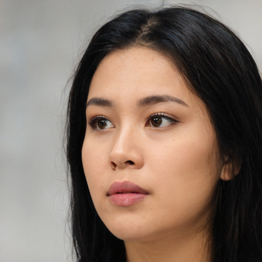 Neutral asian young-adult female with long  black hair and brown eyes
