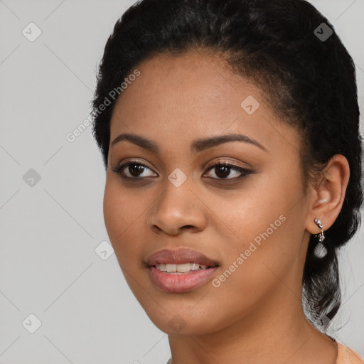 Joyful latino young-adult female with short  black hair and brown eyes