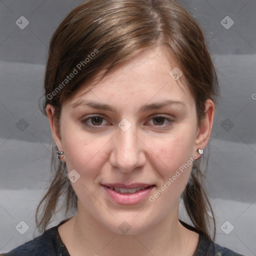 Joyful white young-adult female with medium  brown hair and blue eyes