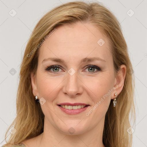 Joyful white adult female with long  brown hair and brown eyes