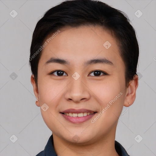 Joyful asian young-adult female with short  brown hair and brown eyes