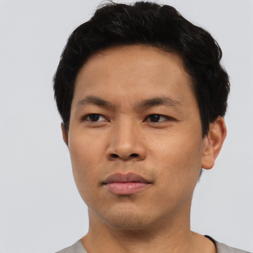 Neutral asian young-adult male with short  black hair and brown eyes