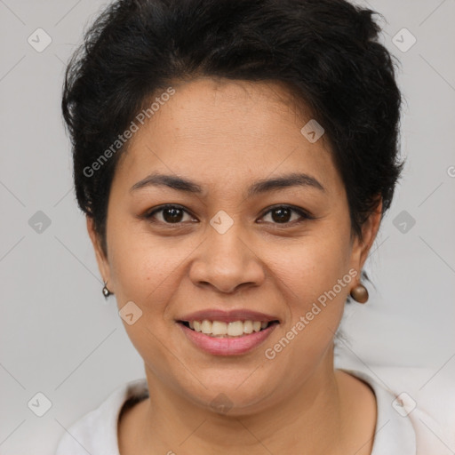 Joyful latino young-adult female with short  brown hair and brown eyes