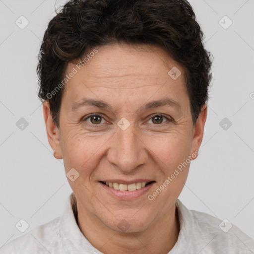 Joyful white adult female with short  brown hair and brown eyes