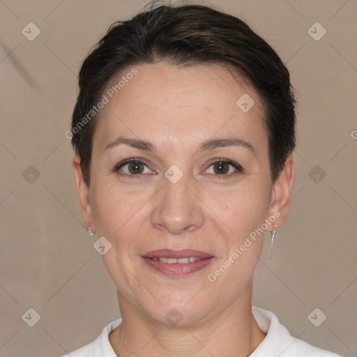 Joyful white adult female with short  brown hair and brown eyes