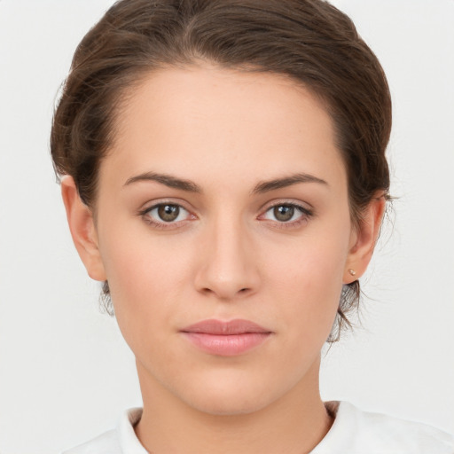 Neutral white young-adult female with medium  brown hair and brown eyes