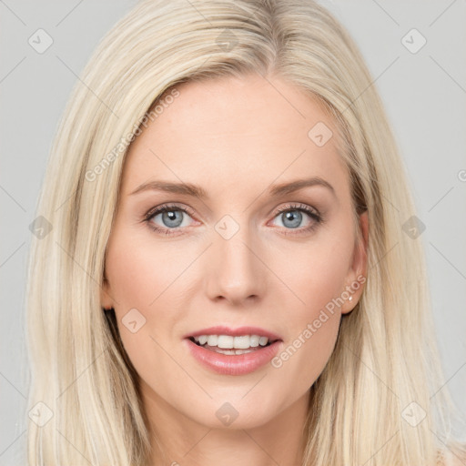 Joyful white young-adult female with long  brown hair and blue eyes