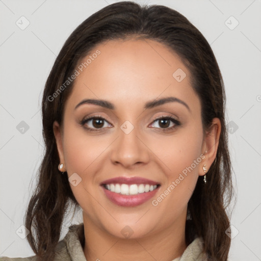 Joyful white young-adult female with long  brown hair and brown eyes