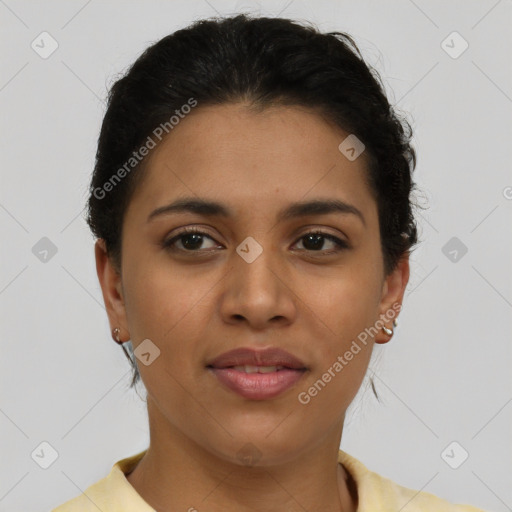 Joyful latino young-adult female with short  brown hair and brown eyes