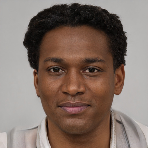 Neutral black young-adult male with short  brown hair and brown eyes