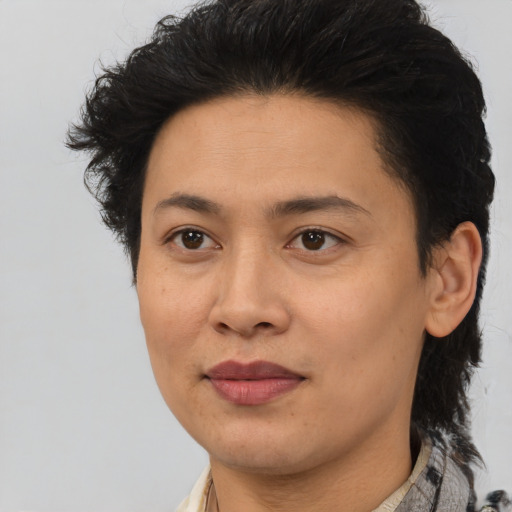 Joyful asian adult female with medium  brown hair and brown eyes