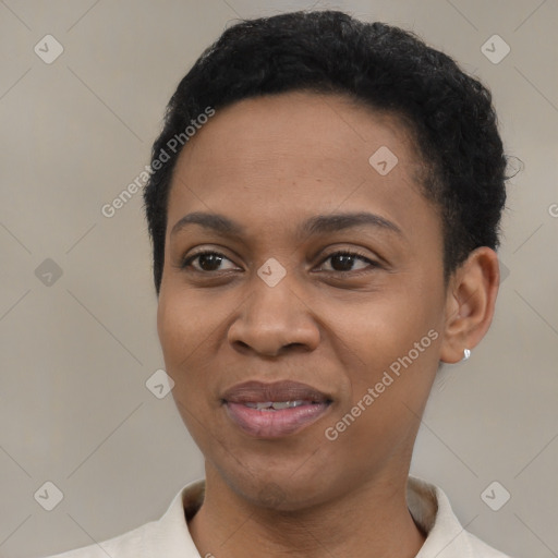 Joyful black young-adult female with short  black hair and brown eyes