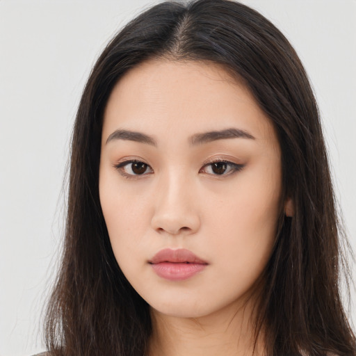 Neutral asian young-adult female with long  brown hair and brown eyes