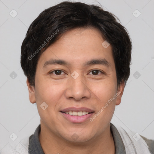 Joyful white adult male with short  brown hair and brown eyes