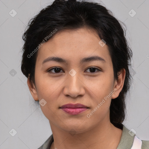 Joyful asian young-adult female with medium  black hair and brown eyes