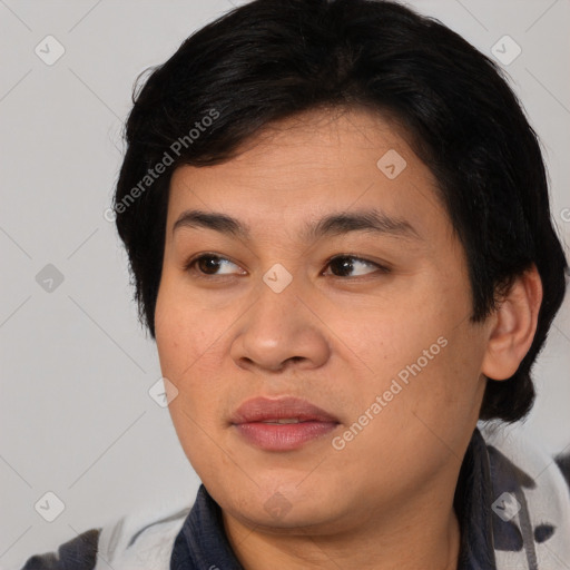 Joyful asian young-adult female with medium  black hair and brown eyes