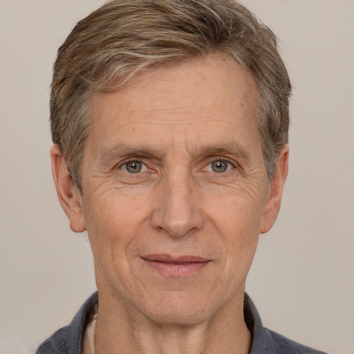 Joyful white middle-aged male with short  brown hair and brown eyes