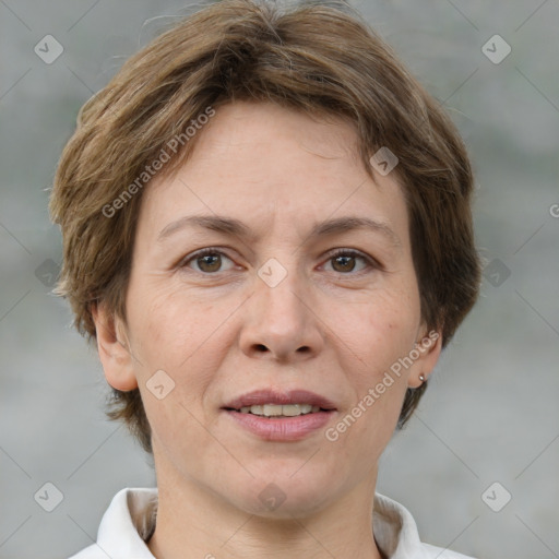 Joyful white adult female with short  brown hair and brown eyes