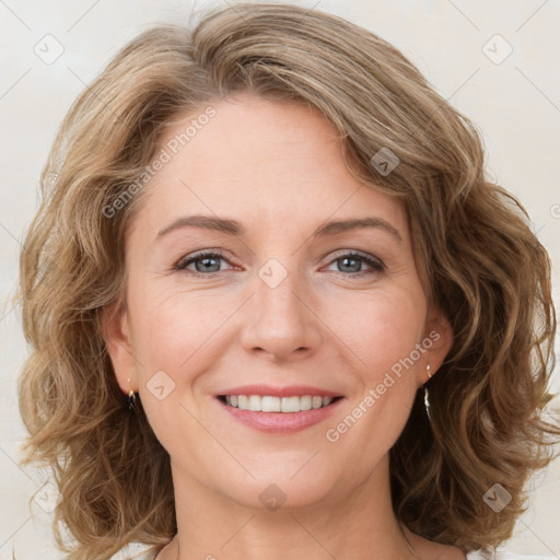 Joyful white young-adult female with medium  brown hair and green eyes