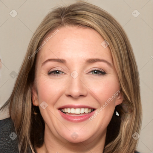 Joyful white adult female with medium  brown hair and grey eyes