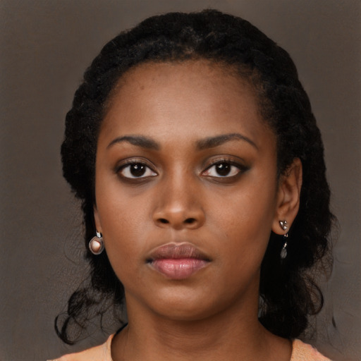 Neutral black young-adult female with long  black hair and brown eyes