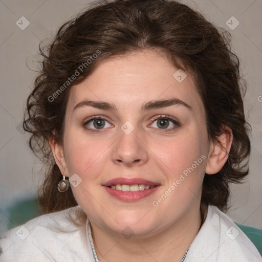 Joyful white young-adult female with medium  brown hair and green eyes