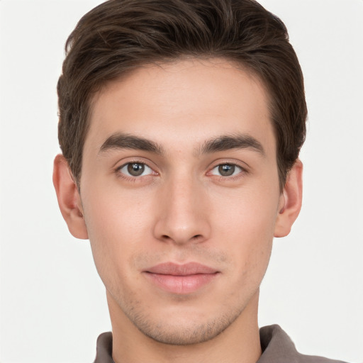 Neutral white young-adult male with short  brown hair and brown eyes