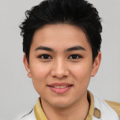 Joyful asian young-adult female with short  black hair and brown eyes