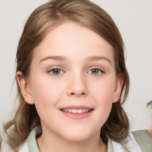 Joyful white child female with medium  brown hair and blue eyes