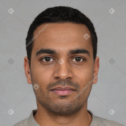 Neutral latino young-adult male with short  black hair and brown eyes